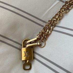 Authentic Louis Vuitton lock and key # 332 with chain